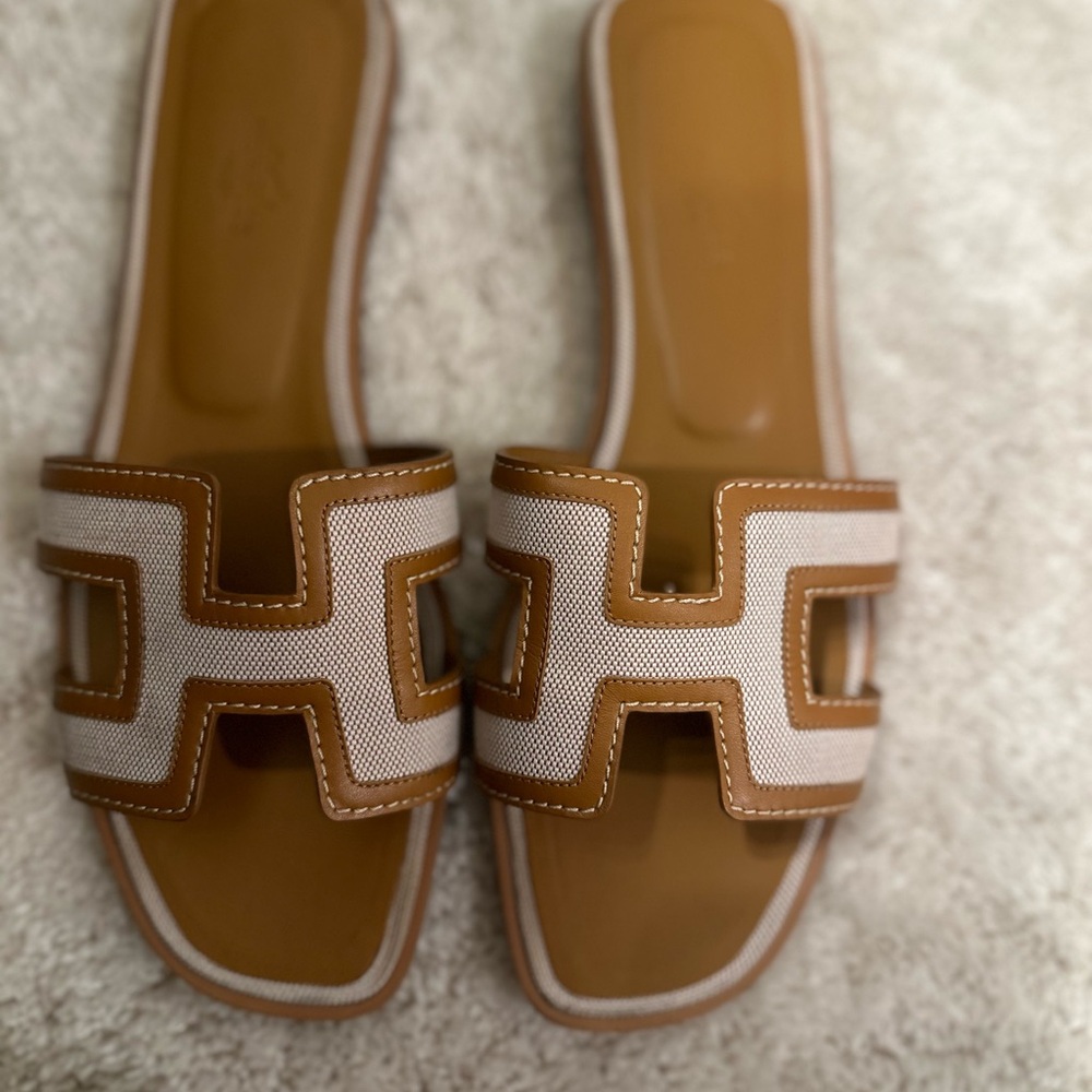 Hermes Oran Tan and White Slide Sandals